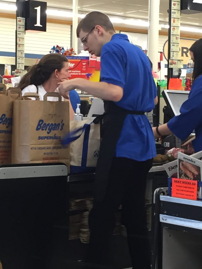 Thomas bagging groceries